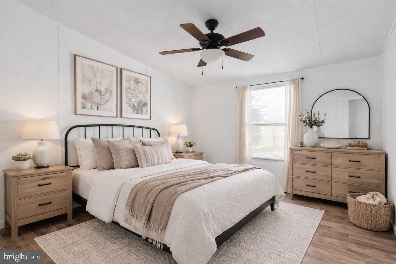 14227 Springfield Lane King George, VA 22485 - Photo 13 of 22 Serene bedroom with natural light.