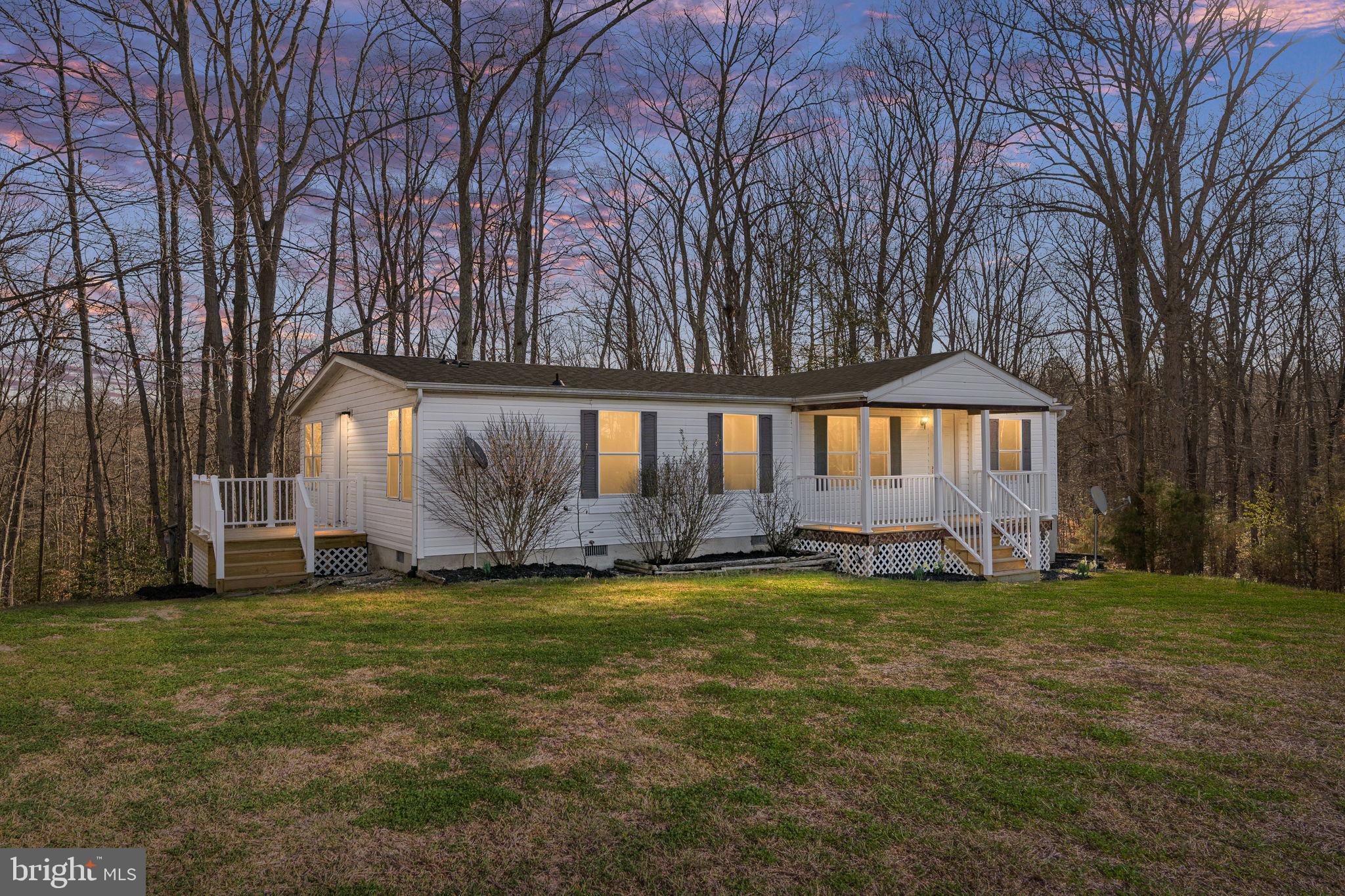 14227 Springfield Lane King George, VA 22485 - Photo 2 of 22 Charming home nestled in serene woods.