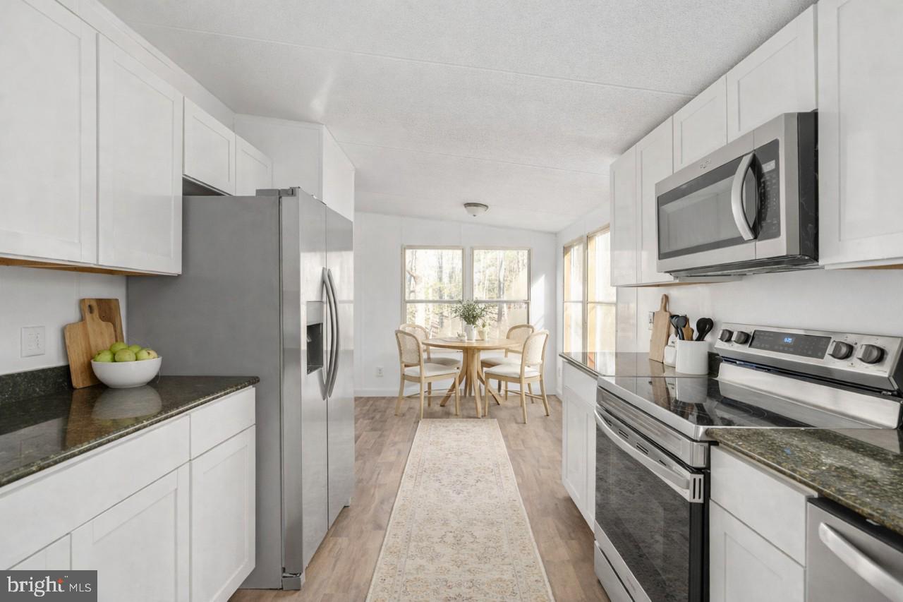 14227 Springfield Lane King George, VA 22485 - Photo 8 of 22 Bright and airy modern kitchen space.