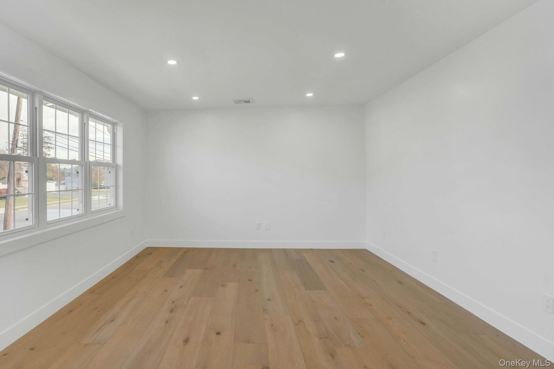 243 Lido Parkway Lindenhurst, NY 11757 - Photo 12 of 46 a view of room with window