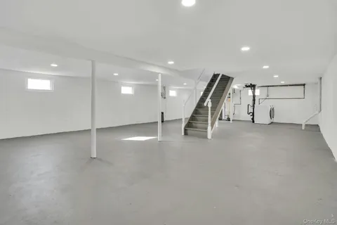 a view of an empty room with a projector