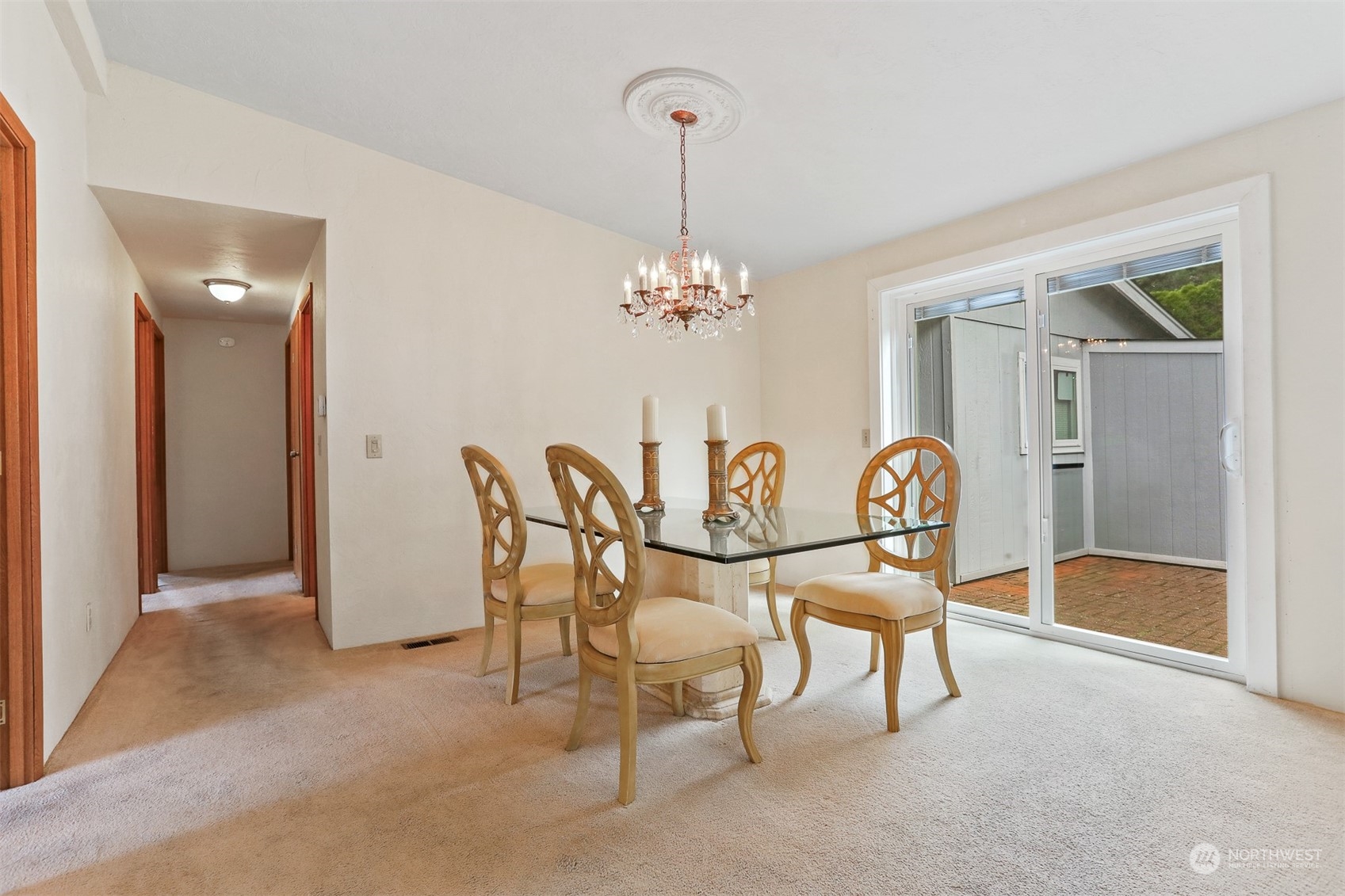 828 240th Place Southwest Bothell, WA 98021 - Photo 12 of 40 a view of a dining room with furniture and chandelier