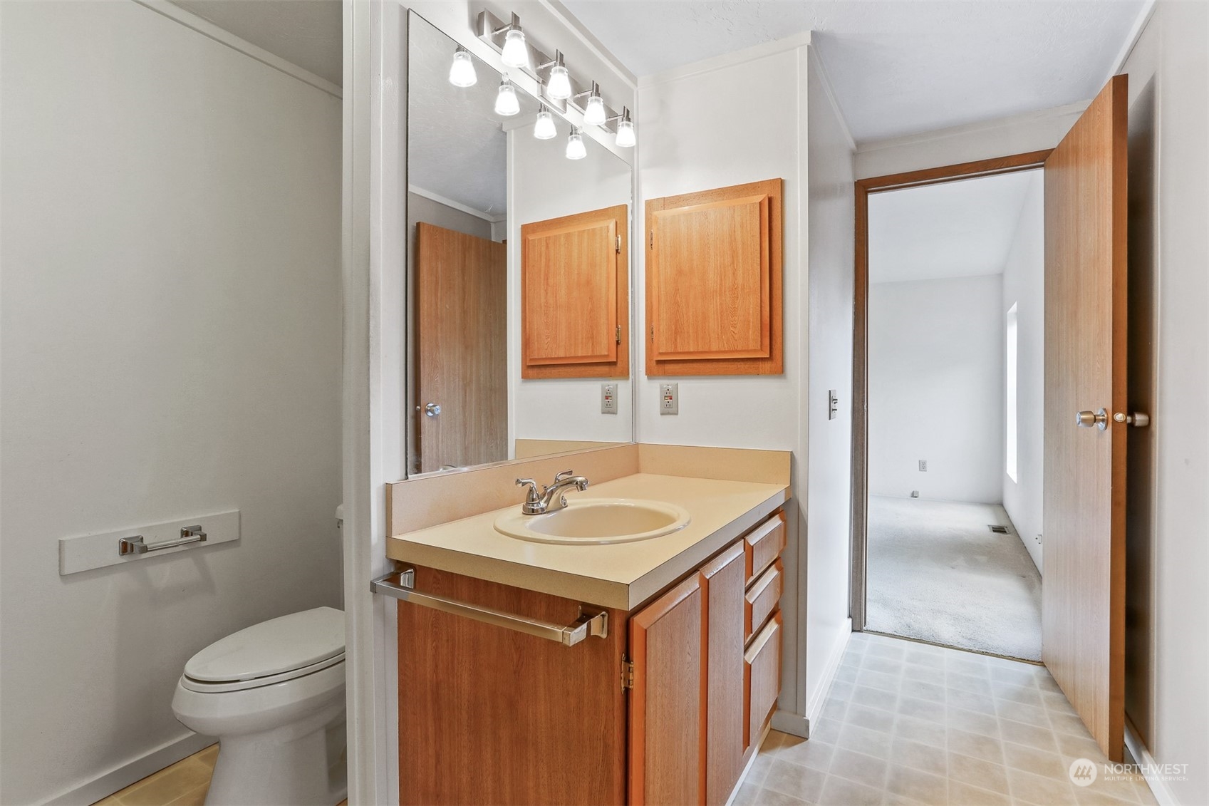 828 240th Place Southwest Bothell, WA 98021 - Photo 17 of 40 a bathroom with a sink and a toilet