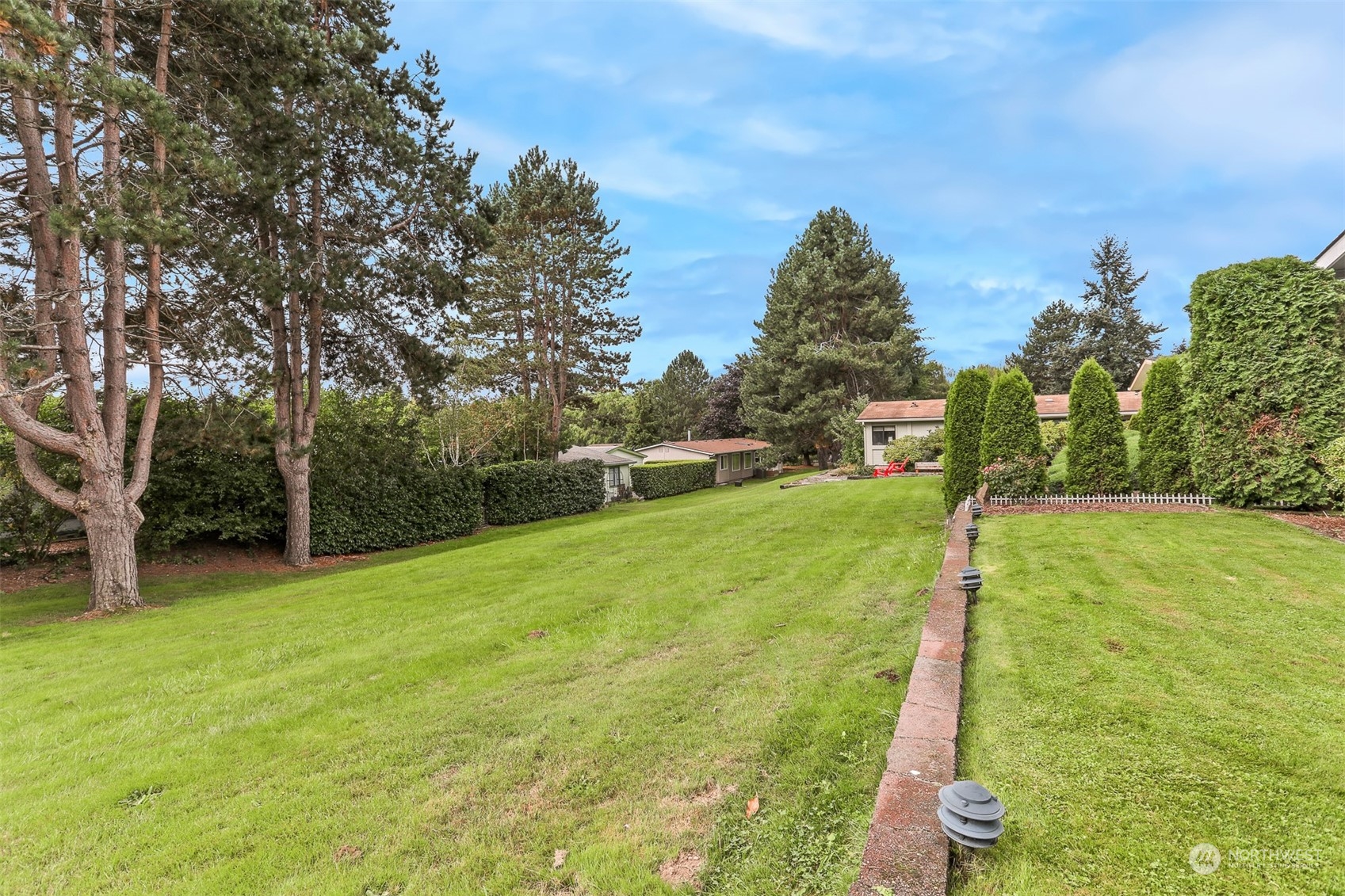 828 240th Place Southwest Bothell, WA 98021 - Photo 28 of 40 a backyard of a house with lots of green space
