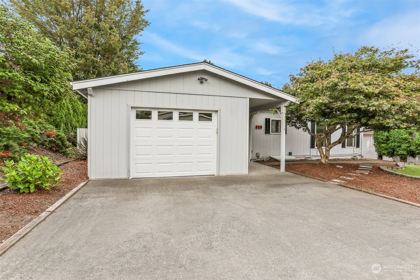 828 240th Place Southwest Bothell, WA 98021 - Photo 30 of 40 a view of garage and yard