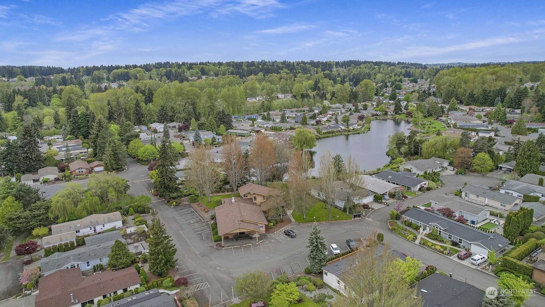 828 240th Place Southwest Bothell, WA 98021 - Photo 38 of 40 an aerial view of a city with lots of residential buildings ocean and mountain view in back