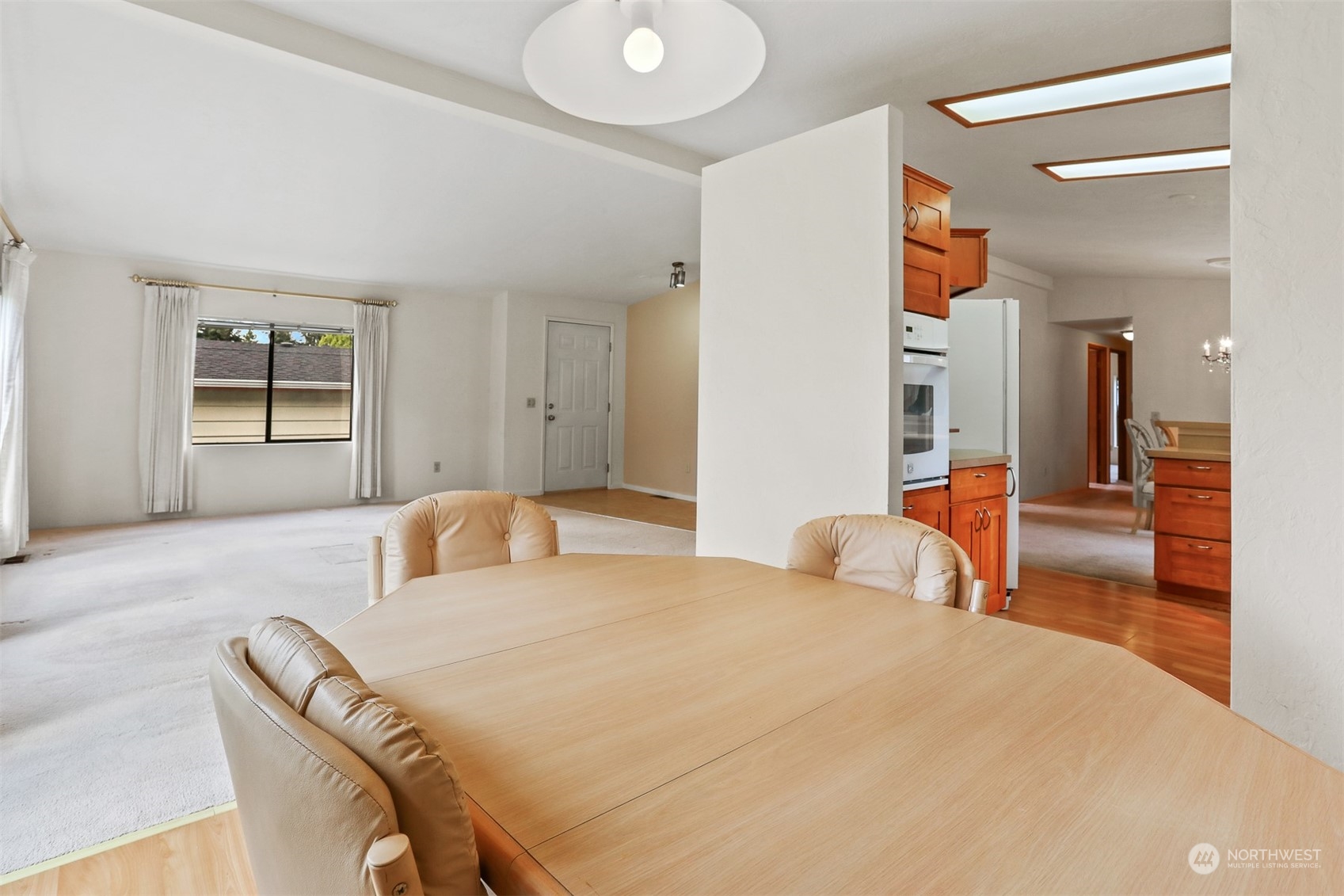 828 240th Place Southwest Bothell, WA 98021 - Photo 6 of 40 a bedroom with a bed and a large mirror