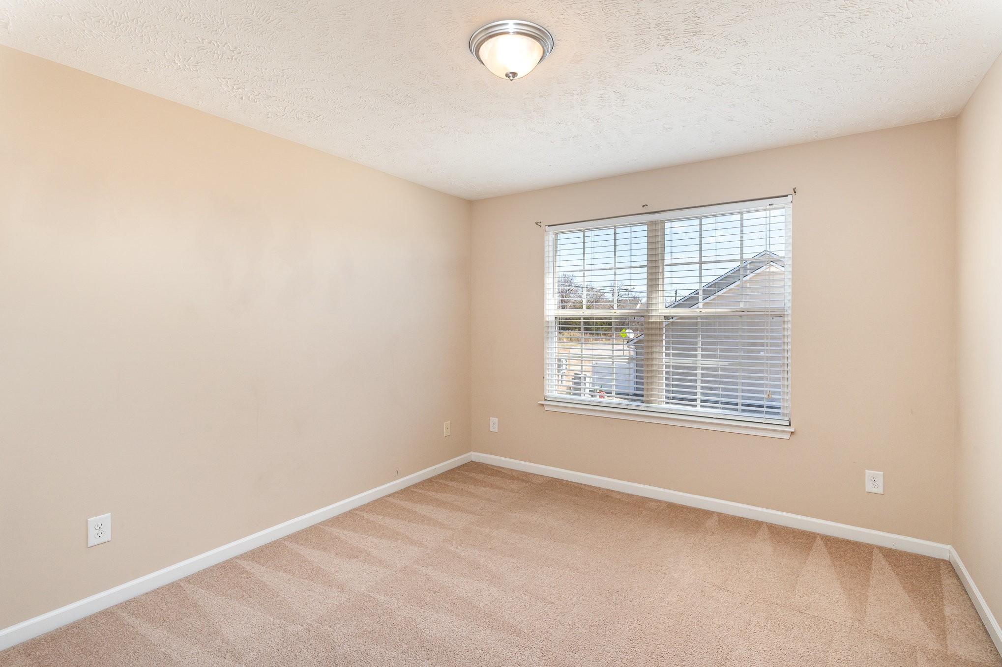 3065 Soaring Eagle Way Spring Hill, TN 37174 - Photo 17 of 25 an empty room with a window