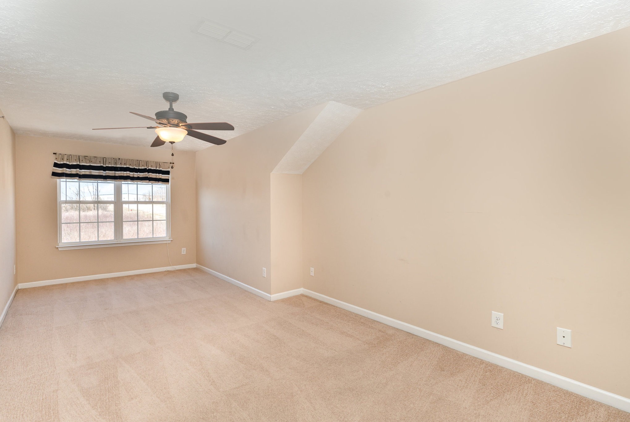 3065 Soaring Eagle Way Spring Hill, TN 37174 - Photo 19 of 25 a view of an empty room with a window