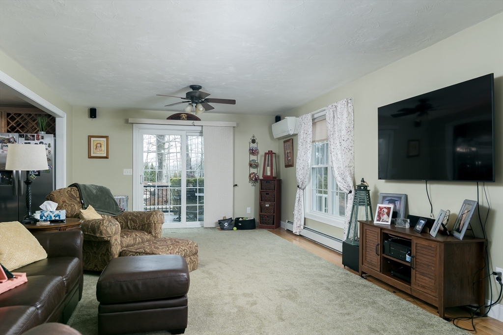 34 Marjorie Lane Rutland, MA 01543 - Photo 7 of 33 a living room with furniture and a flat screen tv