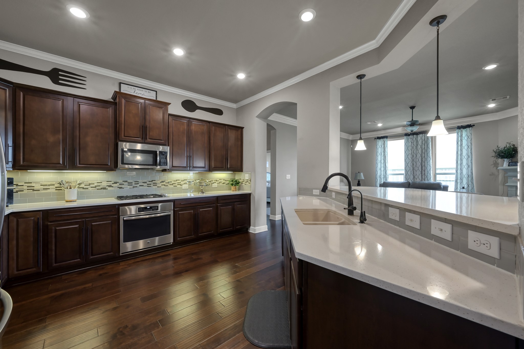 121 Dudley Road Montgomery, TX 77356 - Photo 5 of 36 Rich wood tones create a comfortable and relaxing space
