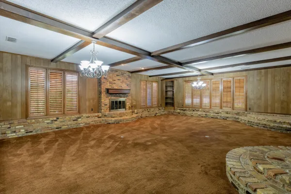 a bathroom with a bathtub shower and a sink