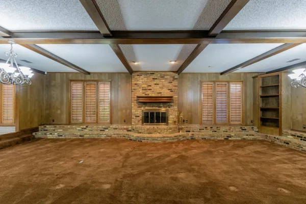 a bathroom with a double vanity sink a mirror and a shower