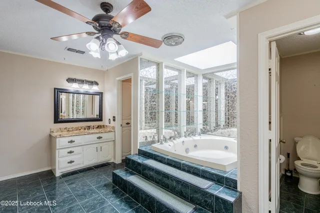 a view of a hallway with wooden shelves