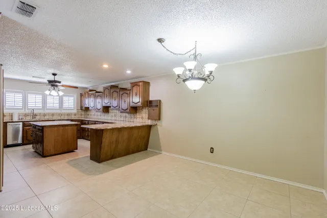 a kitchen with a cabinets and appliances