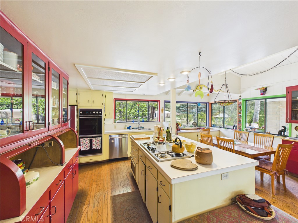 6650 Feliciana Mountain Road Midpines, CA 95345 - Photo 12 of 57 a view of a kitchen with a stove and cabinets