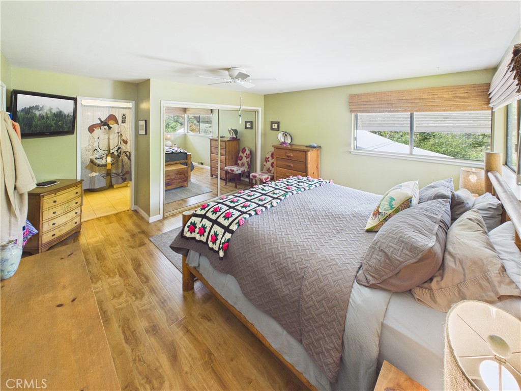 6650 Feliciana Mountain Road Midpines, CA 95345 - Photo 16 of 57 a bed sitting in a bedroom next to a window