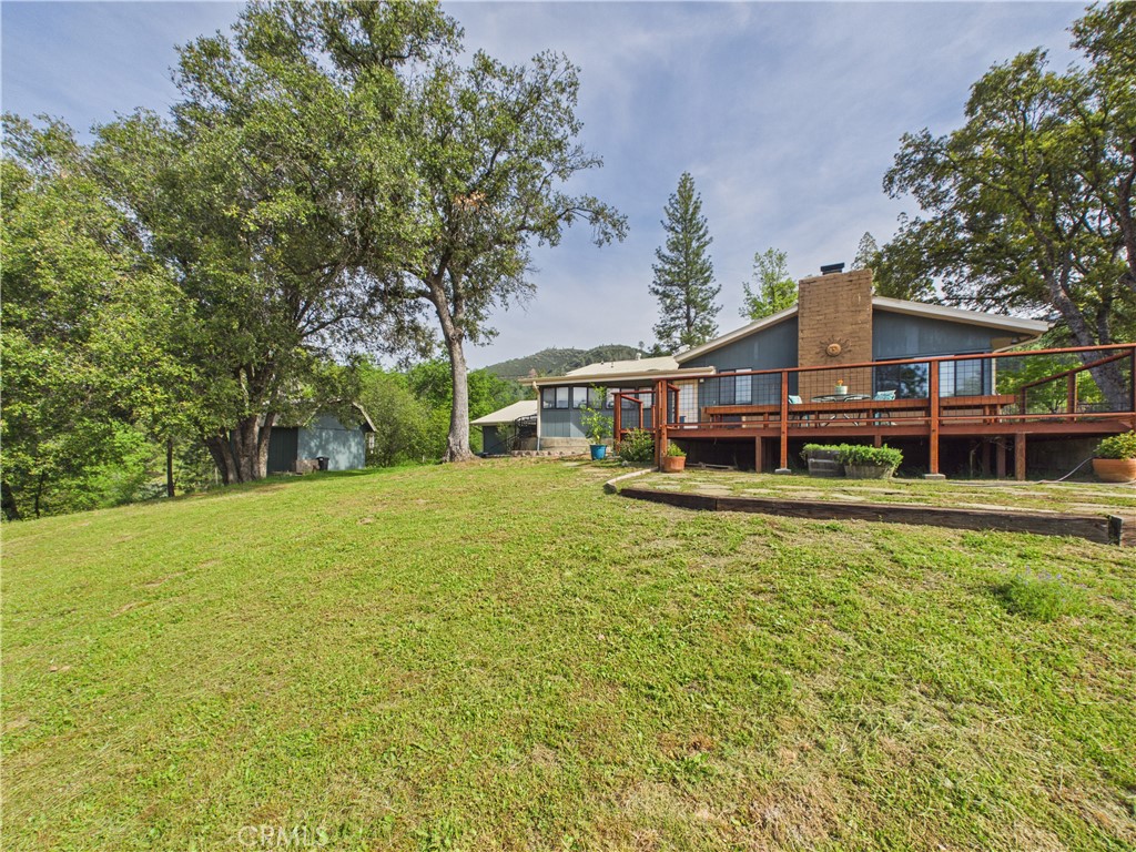 6650 Feliciana Mountain Road Midpines, CA 95345 - Photo 4 of 57 a front view of a house with a yard