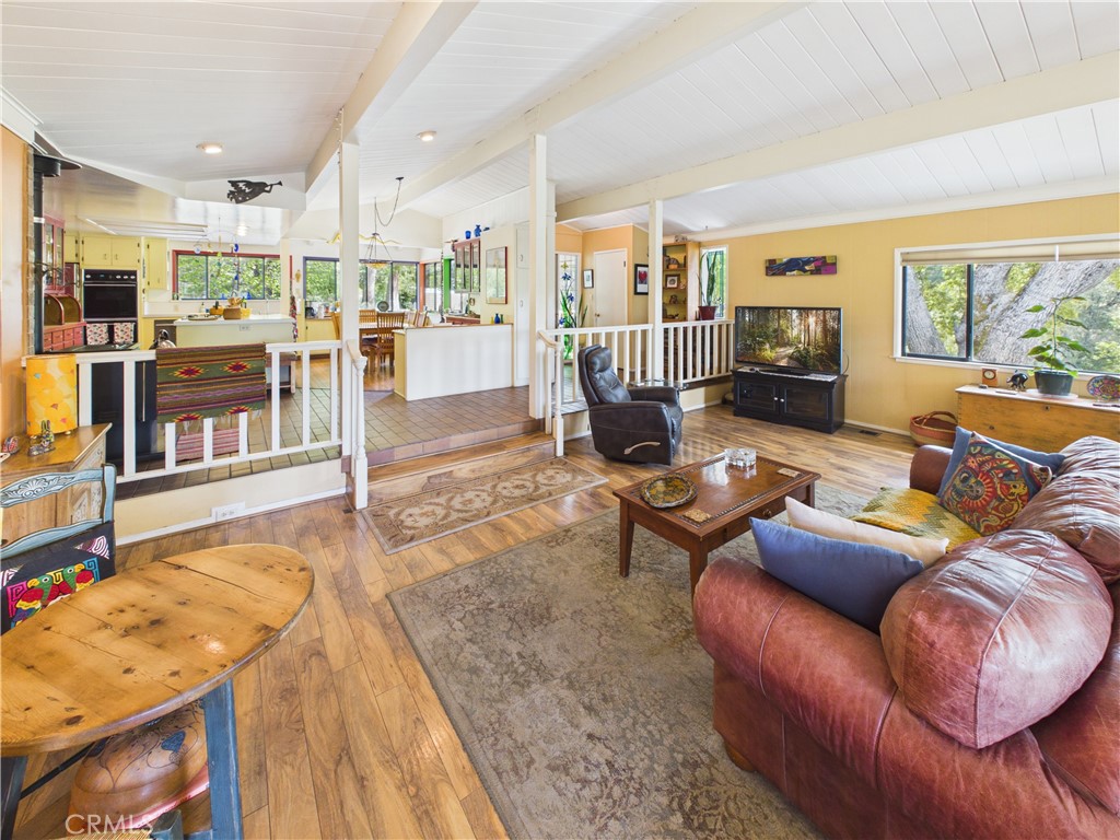 6650 Feliciana Mountain Road Midpines, CA 95345 - Photo 8 of 57 a living room with furniture and a flat screen tv