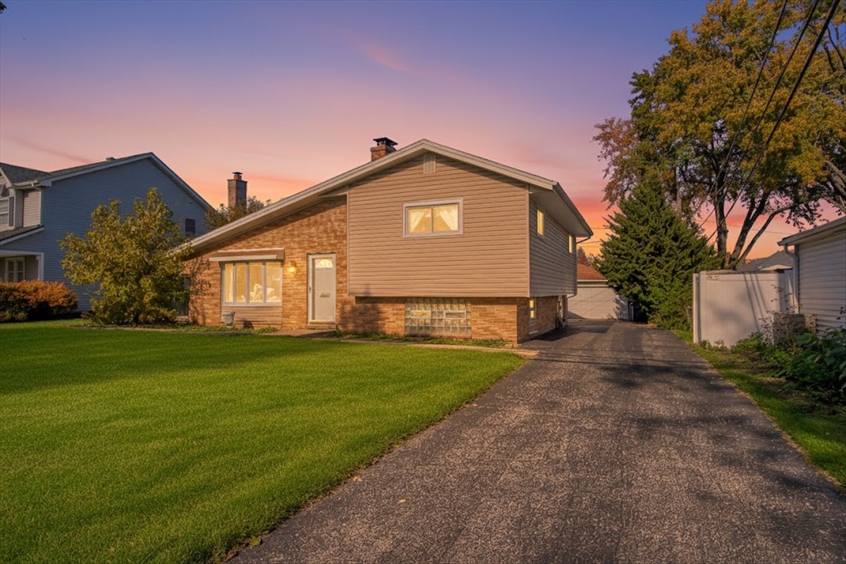 251 West Armitage Avenue Elmhurst, IL 60126 - Photo 1 of 16 a view of a house with a yard