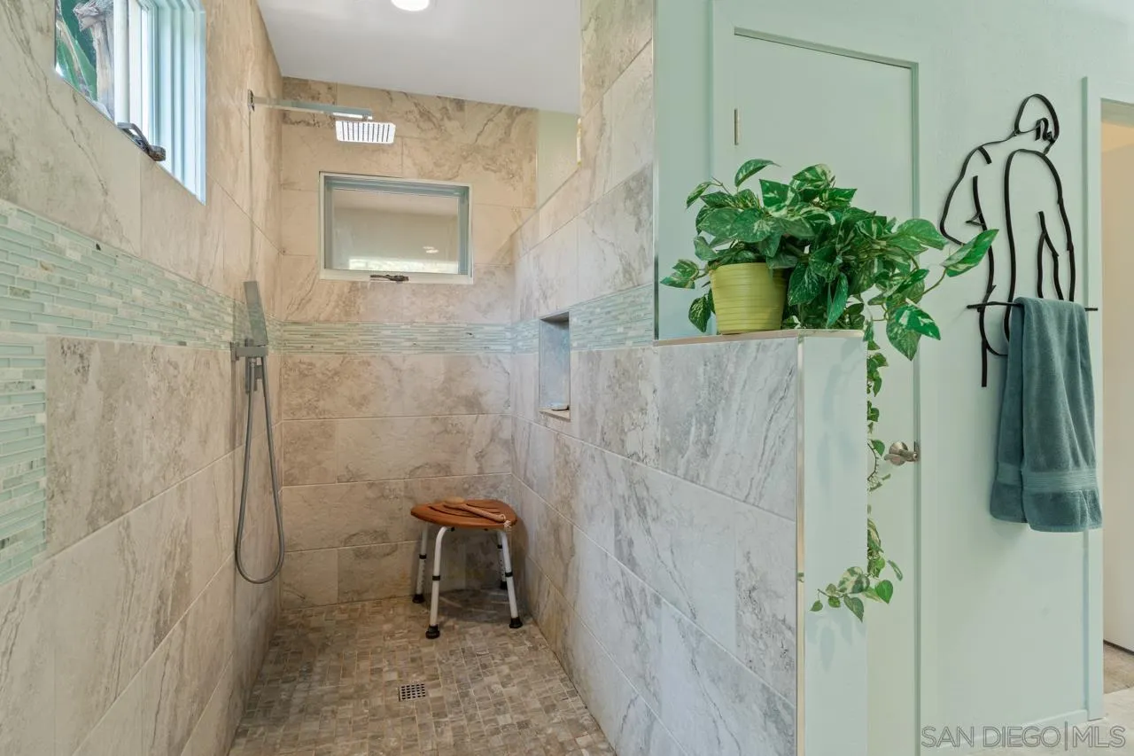 2626 Hidden Valley Road La Jolla, CA 92037 - Photo 23 of 54 a bathroom with a shower