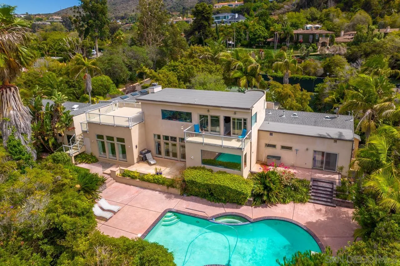 2626 Hidden Valley Road La Jolla, CA 92037 - Photo 5 of 54 an aerial view of a house with a garden
