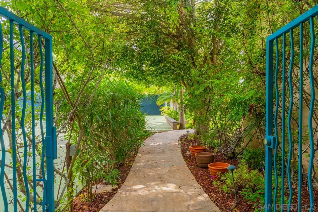 2626 Hidden Valley Road La Jolla, CA 92037 - Photo 6 of 54 a view of a pathway both side of yard