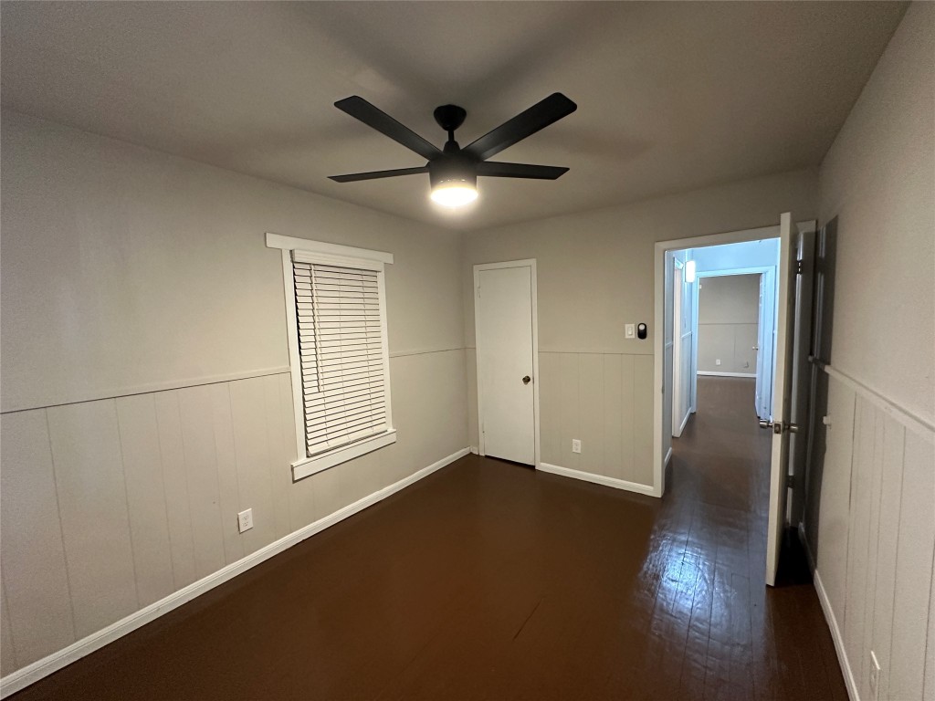 2721 Napoleon Street Houston, TX 77004 - Photo 16 of 19 a view of an empty room with wooden floor and a window