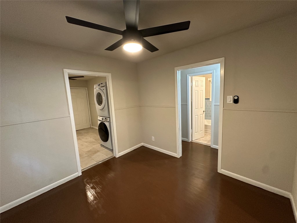 2721 Napoleon Street Houston, TX 77004 - Photo 2 of 19 an empty room with wooden floor and windows