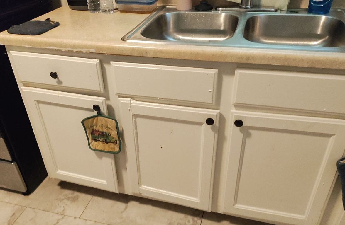 2721 Napoleon Street Houston, TX 77004 - Photo 6 of 19 a close view of a sink and a refrigerator