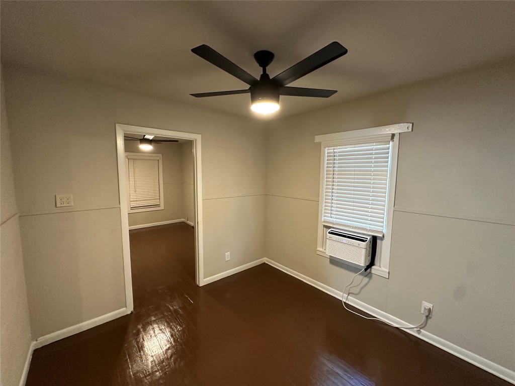 2721 Napoleon Street Houston, TX 77004 - Photo 8 of 19 a view of empty room with wooden floor and fan