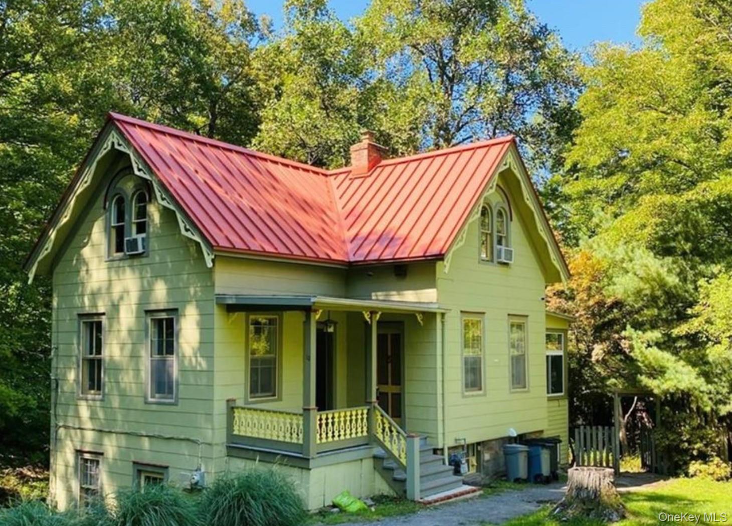 10 Maple Road Cornwall-on-Hudson, NY 12520 - Photo 1 of 1 View of front facade with a porch, a chimney, a standing seam roof, and a metal roof
