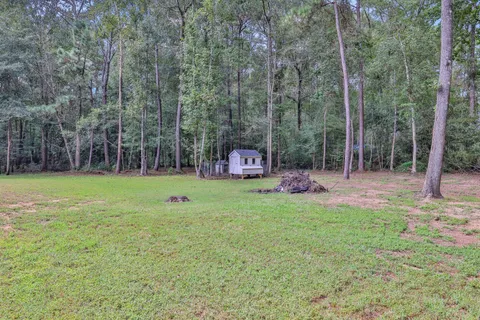 a garden view with a seating space