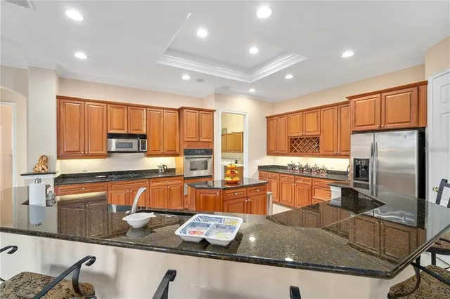 a bedroom with a bed and a lamp