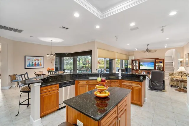 a living room with furniture and a walk in closet