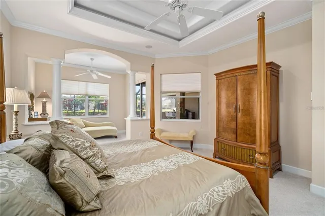 an aerial view of residential houses with outdoor space and swimming pool