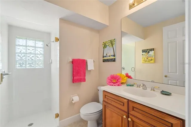 an aerial view of a house with a garden and plants