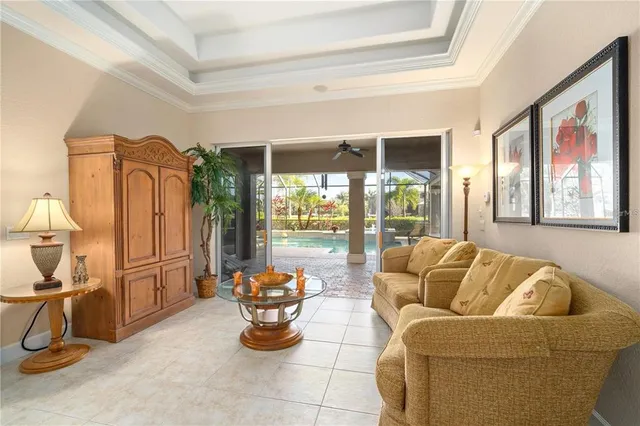 a view of a house with sitting area and garden