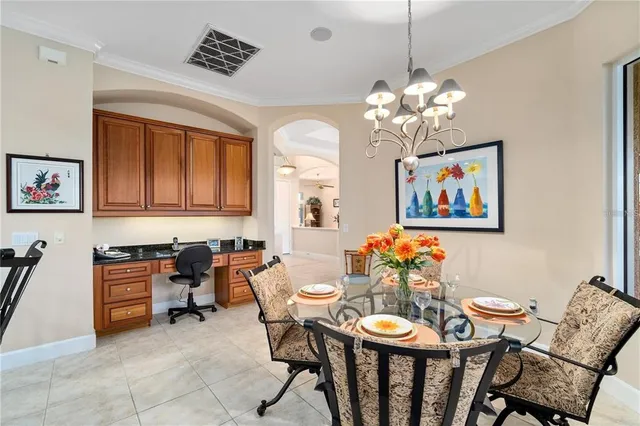 a outdoor dining space with furniture and garden view
