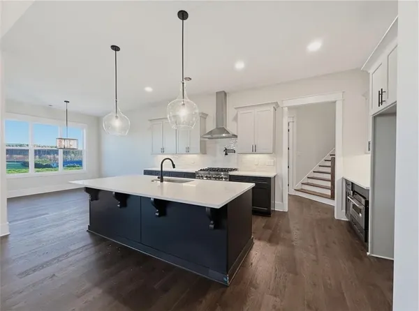 a bathroom with a tub and shower