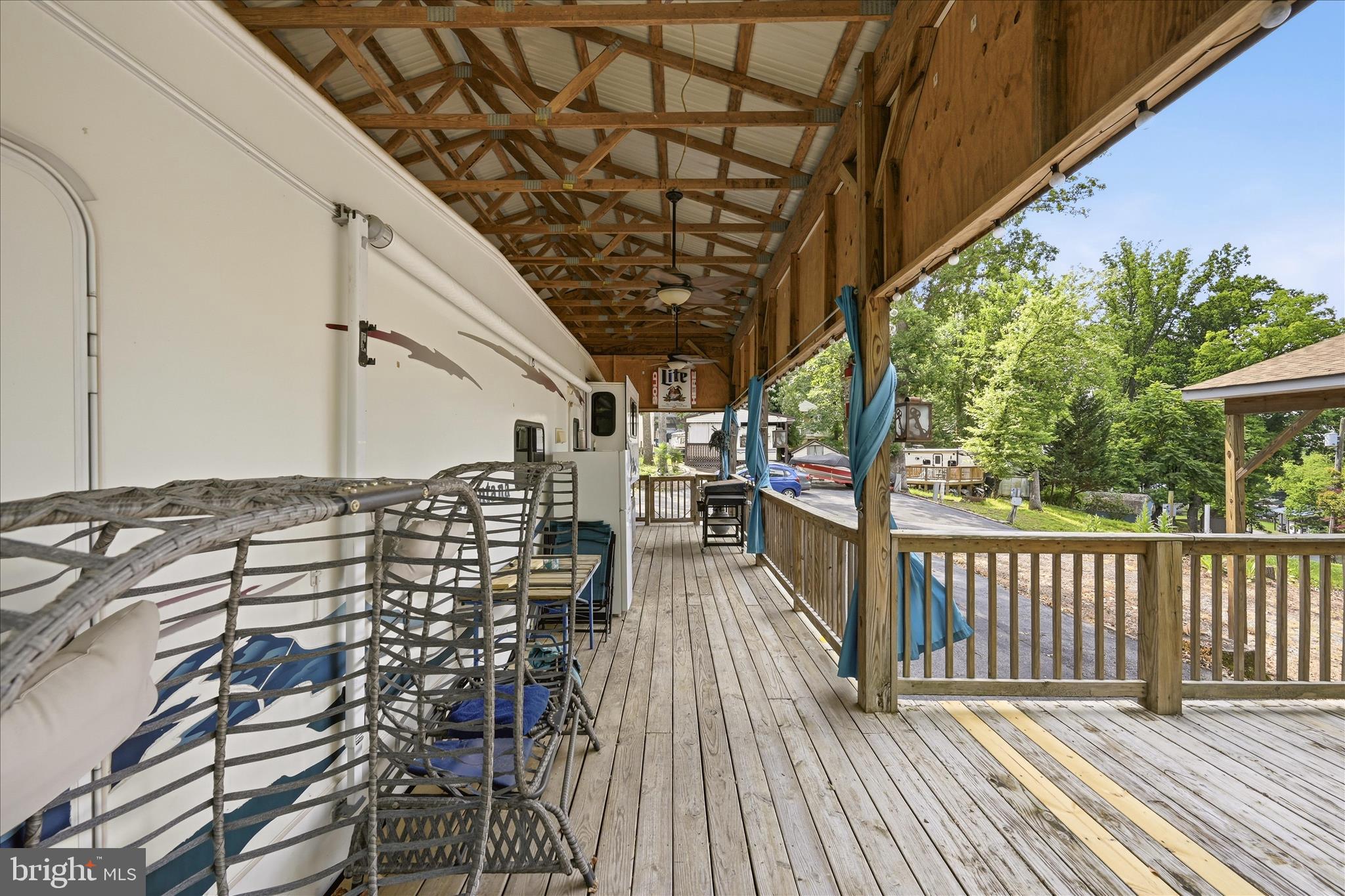 Lot 20 Hot Dog Road Falling Waters, WV 25419 - Photo 14 of 26 a view of a balcony with wooden floor