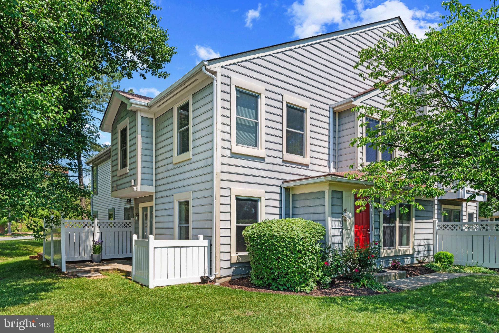 9302 Player Drive, Unit 155 Laurel, MD 20708 - Photo 2 of 43 front view of a house with a yard