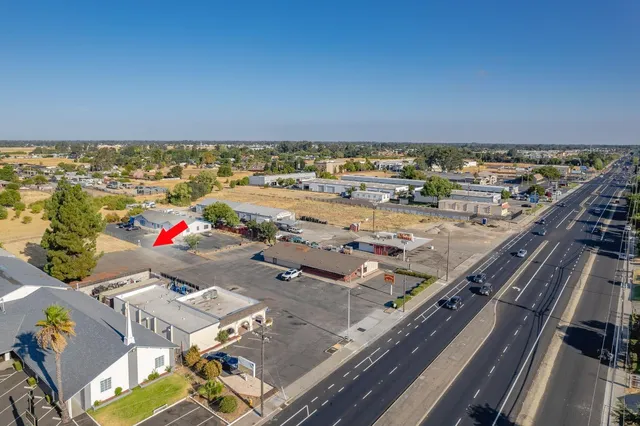 a view of a patio with swimming pool