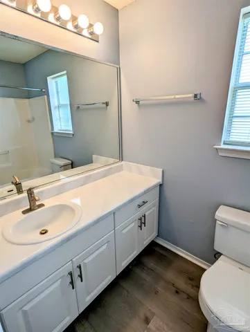 a bathroom with a sink and a toilet