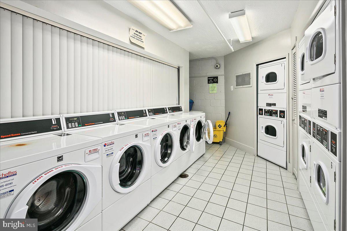 2016 North Adams Street, Unit 701 Arlington, VA 22201 - Photo 23 of 32 a utility room with dryer and washer