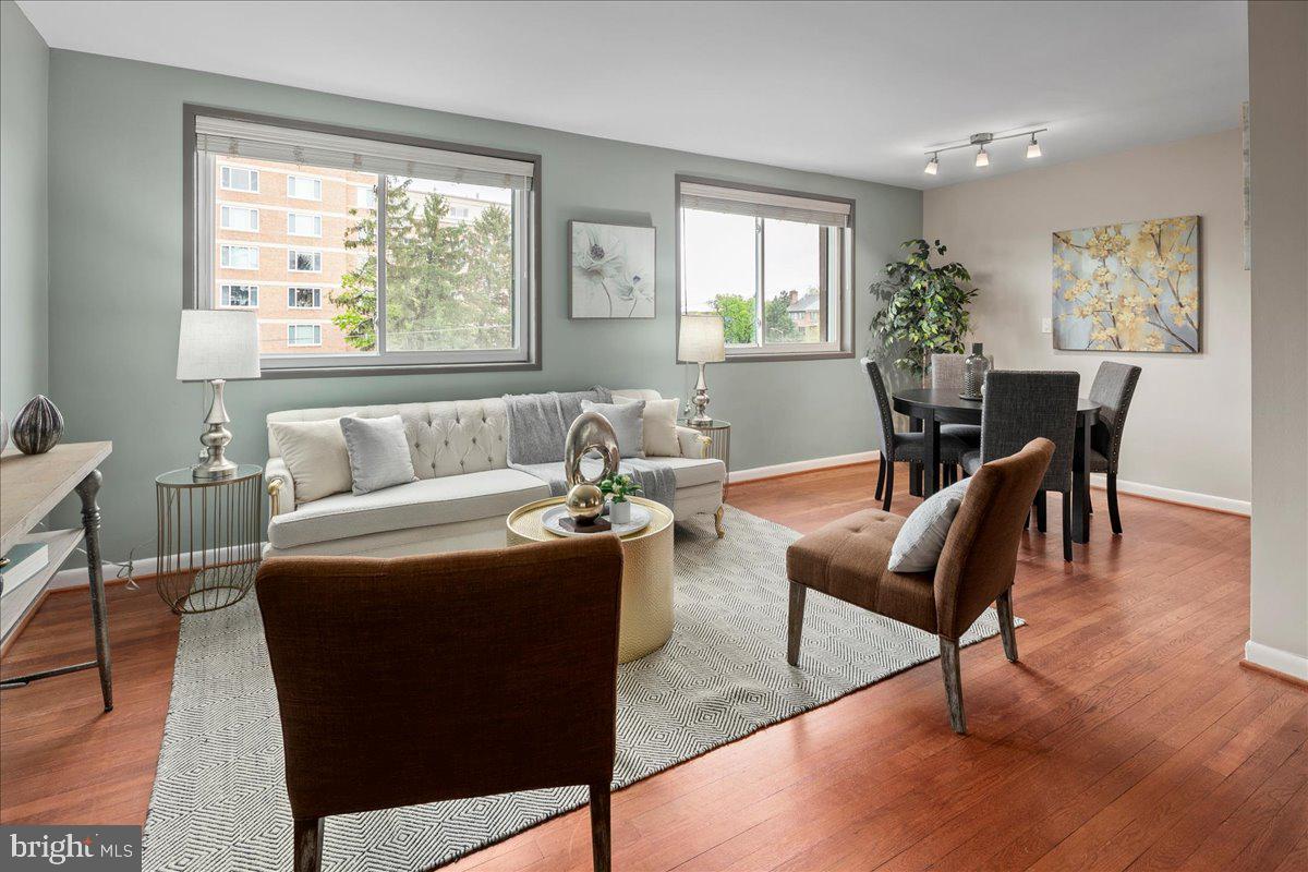 2016 North Adams Street, Unit 701 Arlington, VA 22201 - Photo 4 of 32 a living room with furniture and a large window
