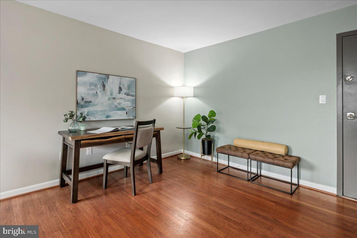 2016 North Adams Street, Unit 701 Arlington, VA 22201 - Photo 7 of 32 a living room with furniture and a wooden floor