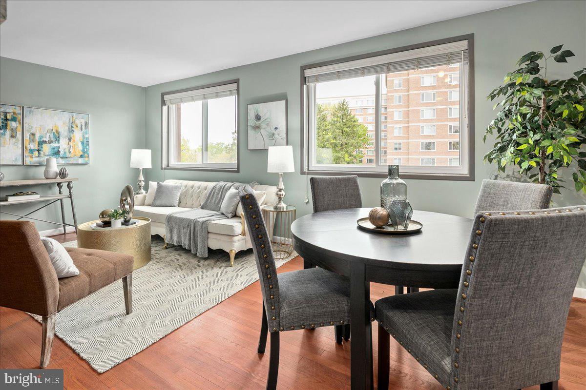 2016 North Adams Street, Unit 701 Arlington, VA 22201 - Photo 10 of 32 a view of a dining room with furniture and window