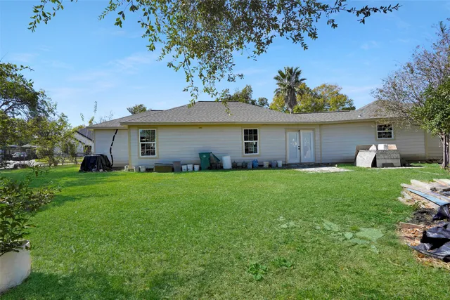 a house view with a garden space