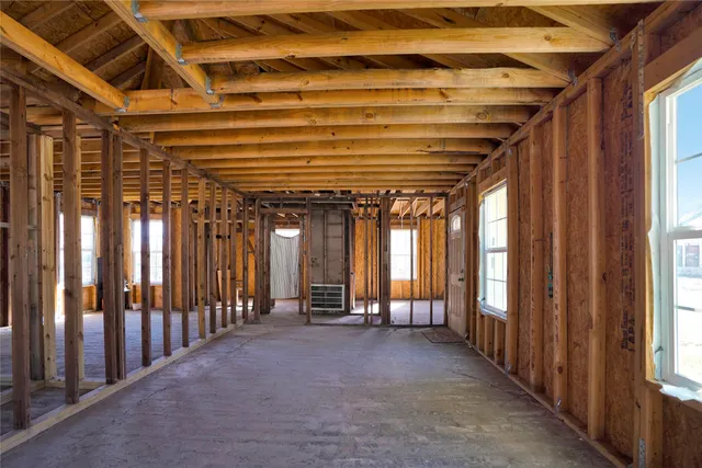 a view of a room with windows